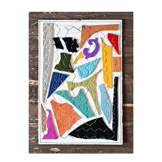 Colorful abstract quilt on a wooden surface